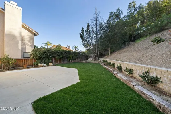 a house view with a outdoor space