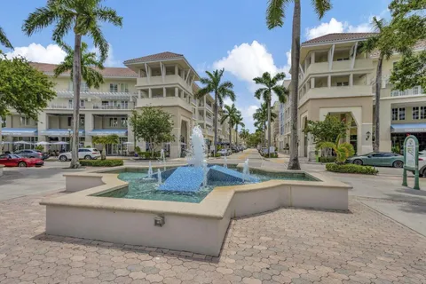 a view of a cafe with sitting area