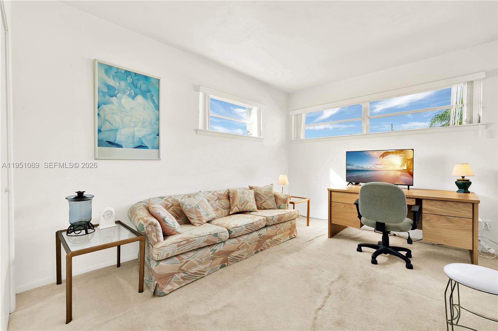 11260 Southwest 181st Terrace Miami, FL 33157 - Photo 27 of 57 a living room with furniture and a work place area