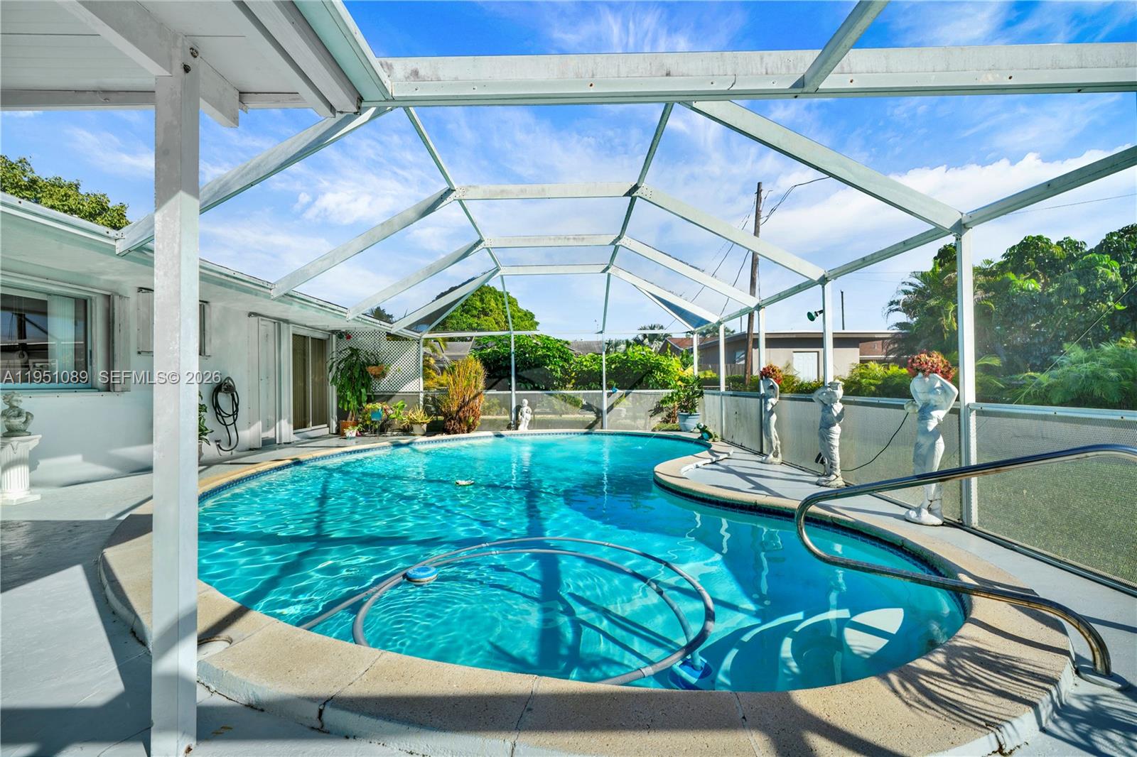 11260 Southwest 181st Terrace Miami, FL 33157 - Photo 32 of 57 a view of a backyard with sitting area