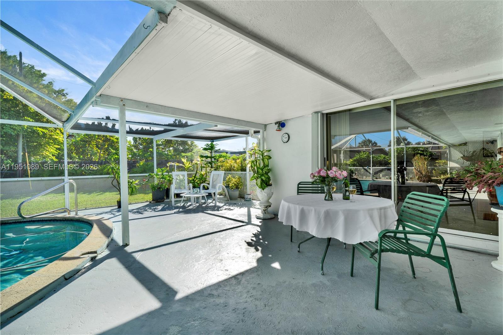 11260 Southwest 181st Terrace Miami, FL 33157 - Photo 33 of 57 a view of a backyard with sitting area and furniture