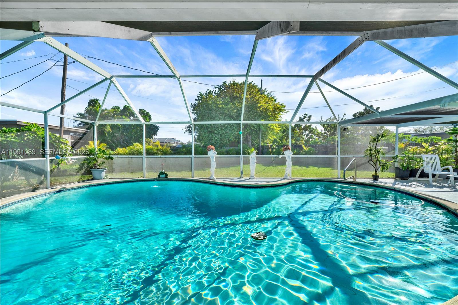 11260 Southwest 181st Terrace Miami, FL 33157 - Photo 38 of 57 a view of yard with a swimming pool