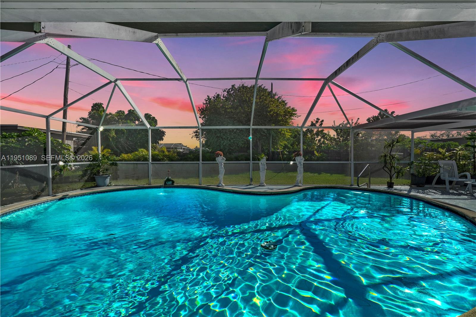 11260 Southwest 181st Terrace Miami, FL 33157 - Photo 39 of 57 a view of a house with a yard