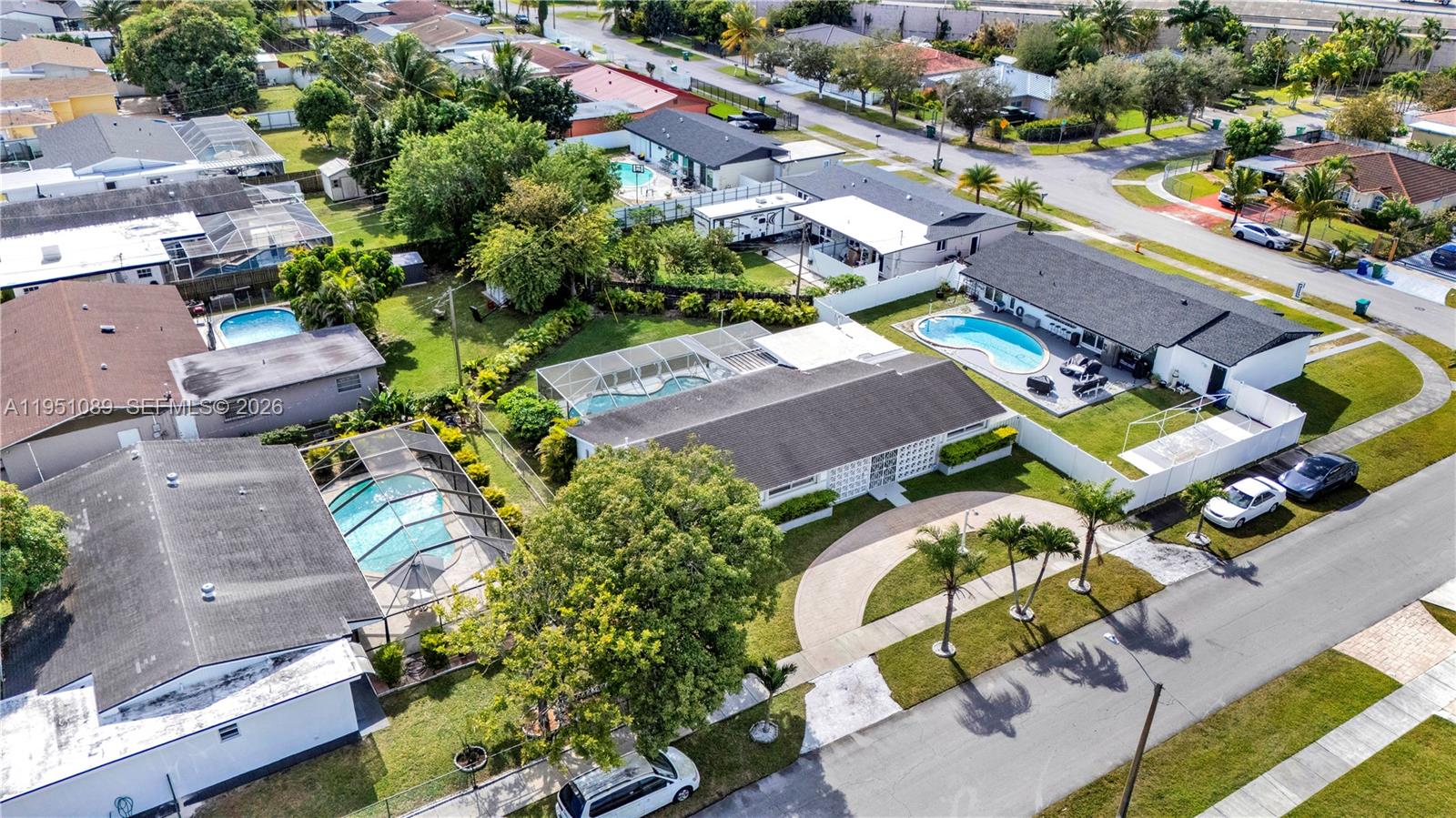 11260 Southwest 181st Terrace Miami, FL 33157 - Photo 49 of 57 an aerial view of a swimming pool and outdoor space