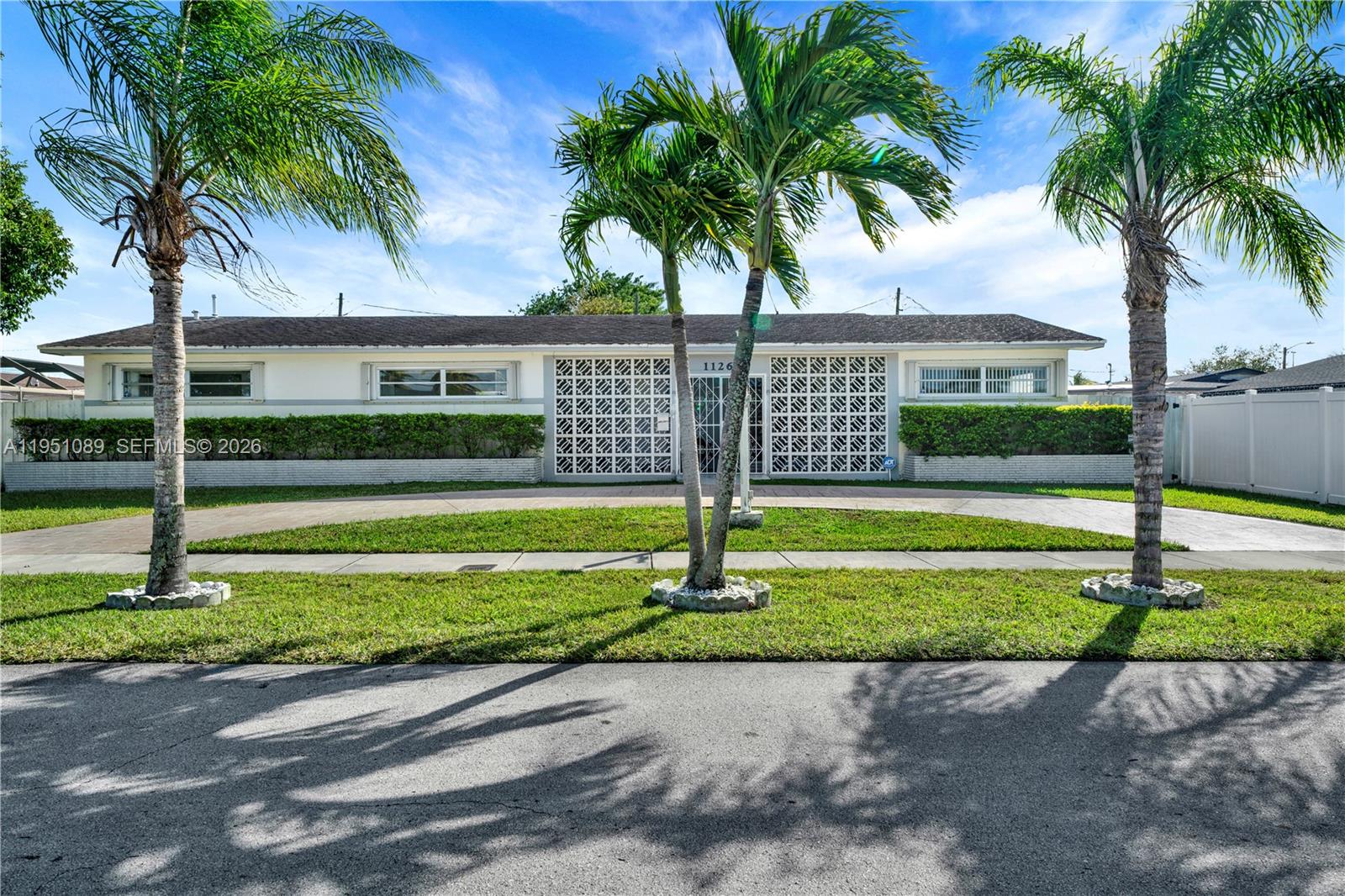 11260 Southwest 181st Terrace Miami, FL 33157 - Photo 56 of 57 a view of a swimming pool with a garden