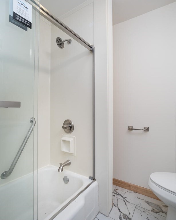 70 Leverett Road Amherst, MA 01002 - Photo 17 of 42 a bathroom with a sink a toilet and shower