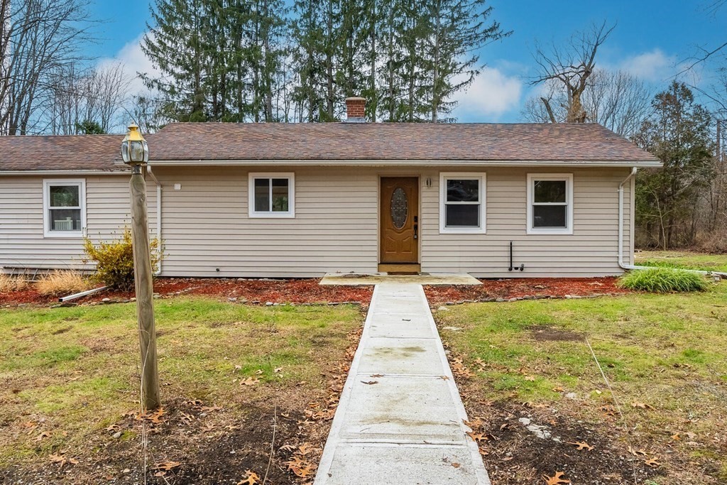70 Leverett Road Amherst, MA 01002 - Photo 3 of 42 a front view of a house with yard