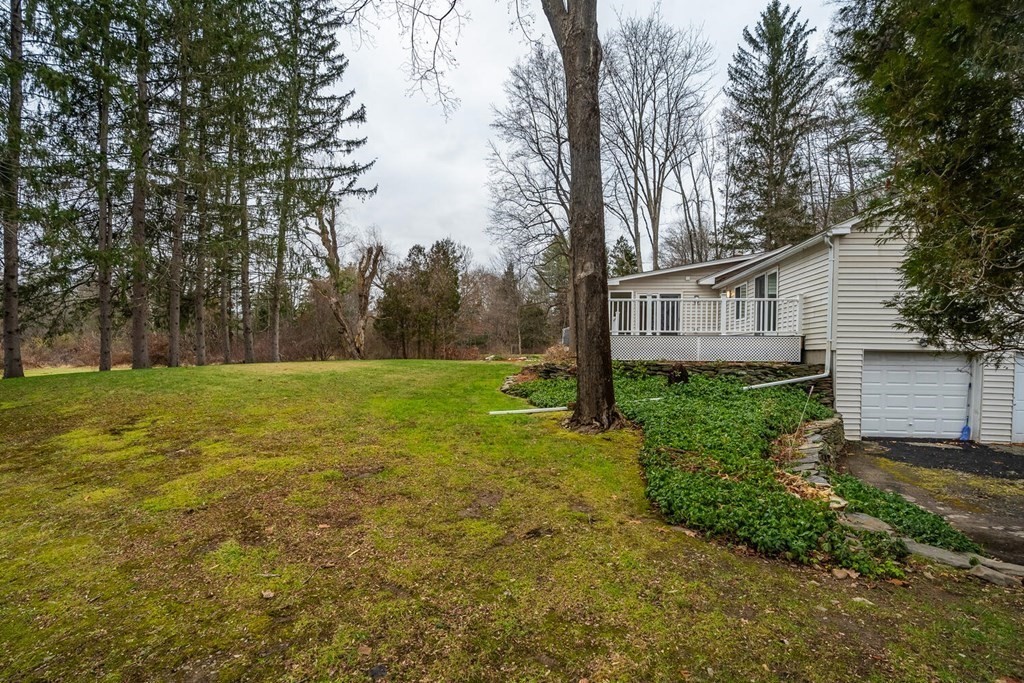 70 Leverett Road Amherst, MA 01002 - Photo 41 of 42 a view of a house with backyard and trees