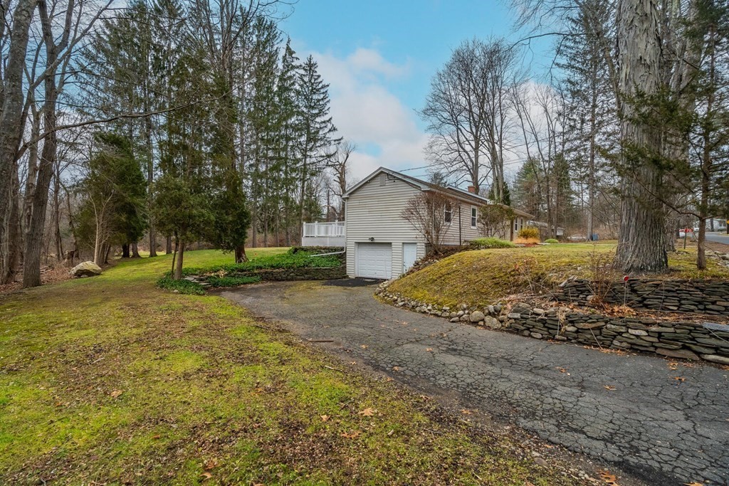 70 Leverett Road Amherst, MA 01002 - Photo 42 of 42 a view of a yard with a large tree