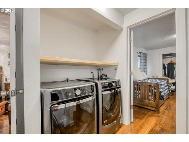 a utility room with dryer and washer