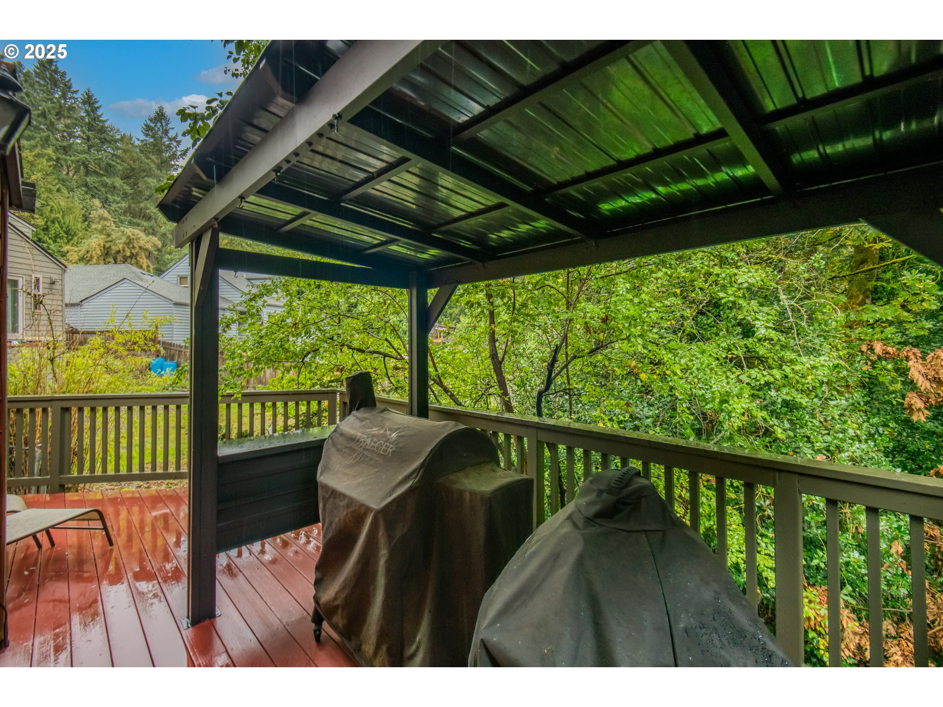 6196 Southwest Capitol Highway Portland, OR 97239 - Photo 16 of 18 a view of balcony with furniture and garden