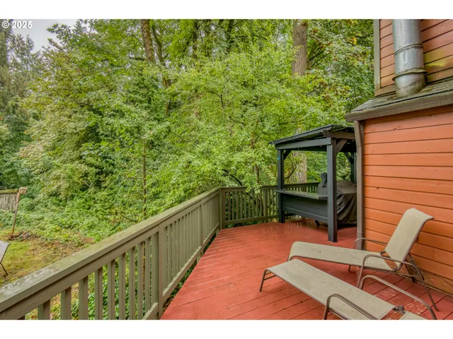a view of balcony with furniture