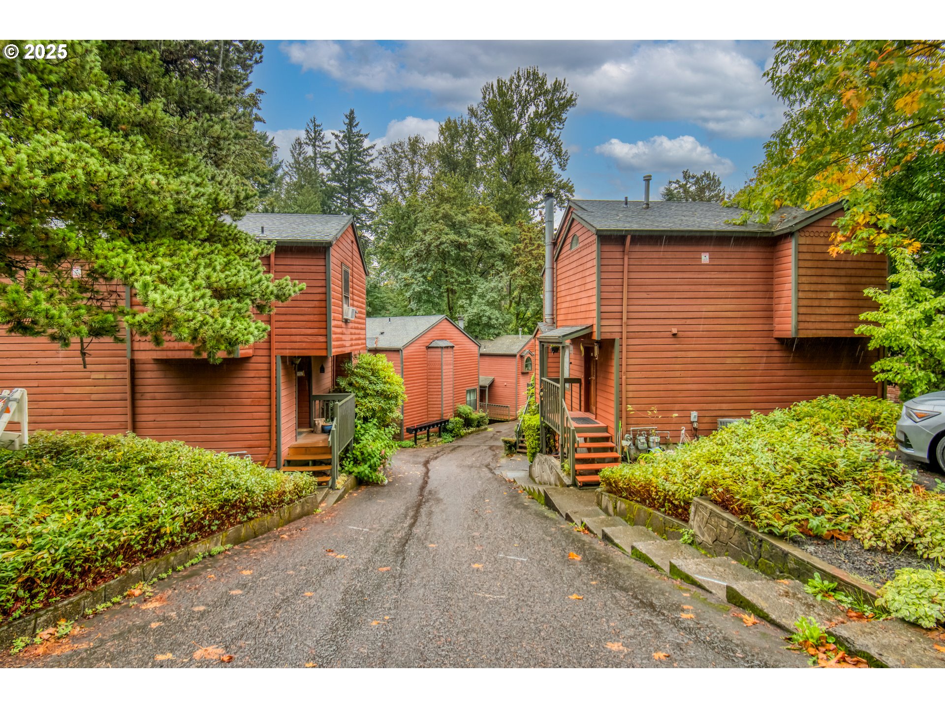 6196 Southwest Capitol Highway Portland, OR 97239 - Photo 18 of 18 a backyard of a house with a garden and outdoor seating