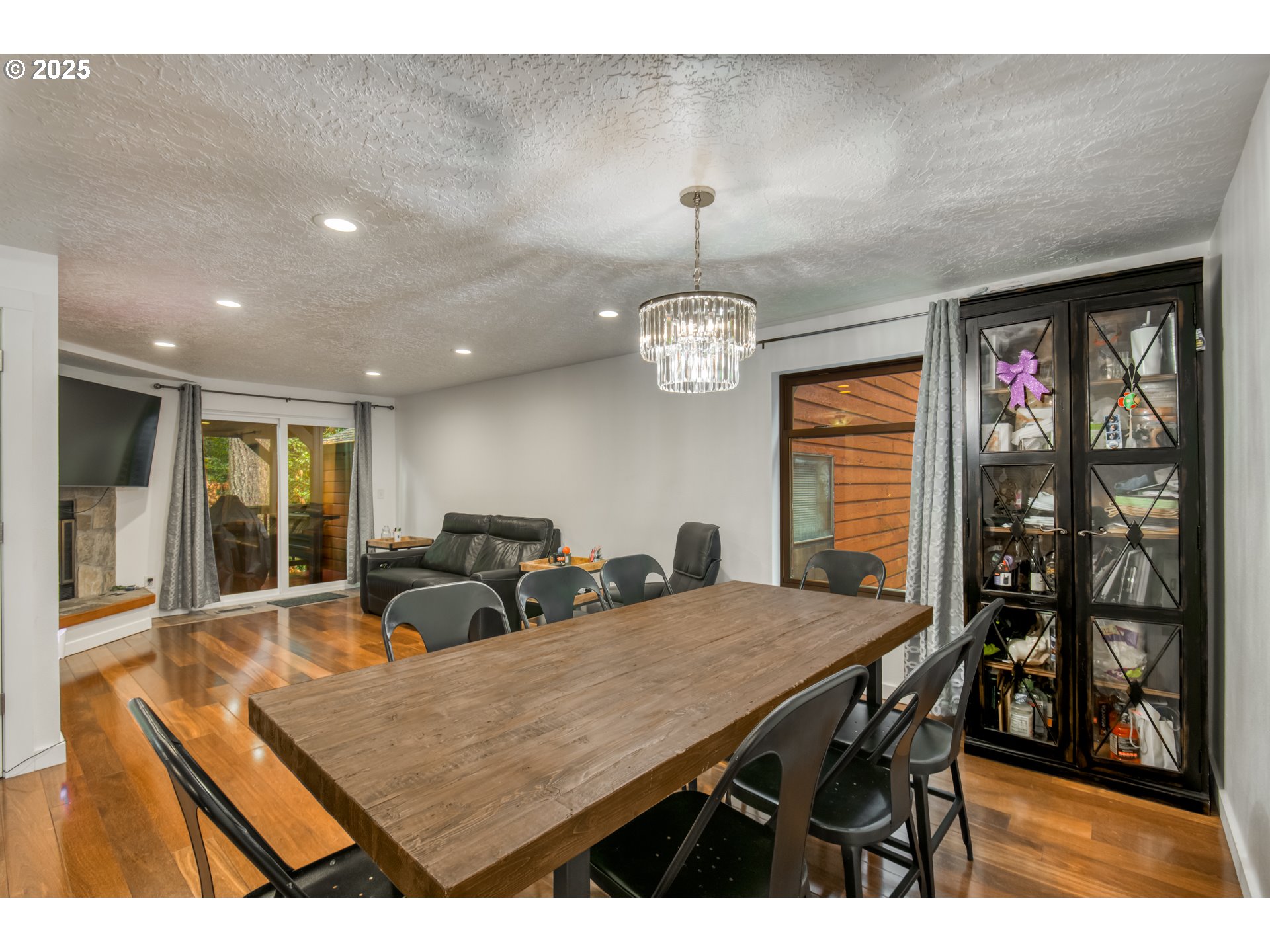 6196 Southwest Capitol Highway Portland, OR 97239 - Photo 5 of 18 a view of a dining room with furniture and chandelier