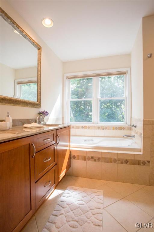 1552 Bushkill Center Road Bath, PA 18014 - Photo 13 of 32 a view of a bathroom with a tub sink and mirror