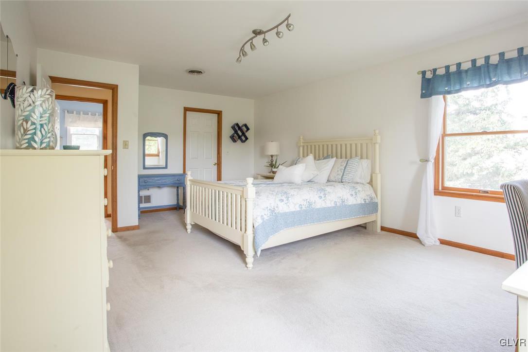1552 Bushkill Center Road Bath, PA 18014 - Photo 17 of 32 a bed room with a bed and a window