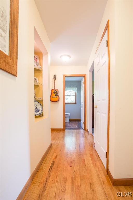1552 Bushkill Center Road Bath, PA 18014 - Photo 7 of 32 a view of a livingroom with wooden floor and staircase