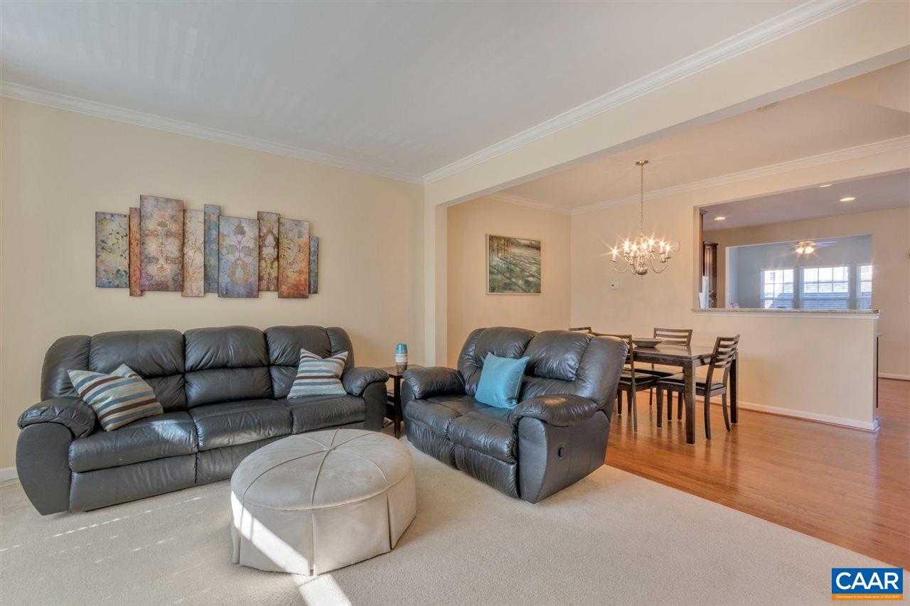 735 Rainier Road Charlottesville, VA 22903 - Photo 11 of 30 a living room with furniture and a wooden floor