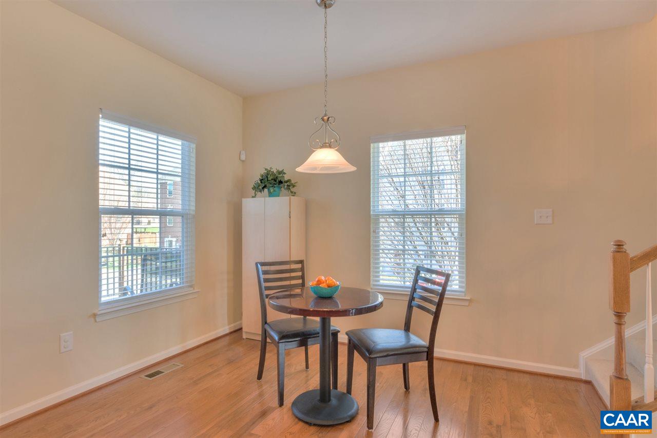 735 Rainier Road Charlottesville, VA 22903 - Photo 16 of 30 a view of a dining room with furniture window and outside view