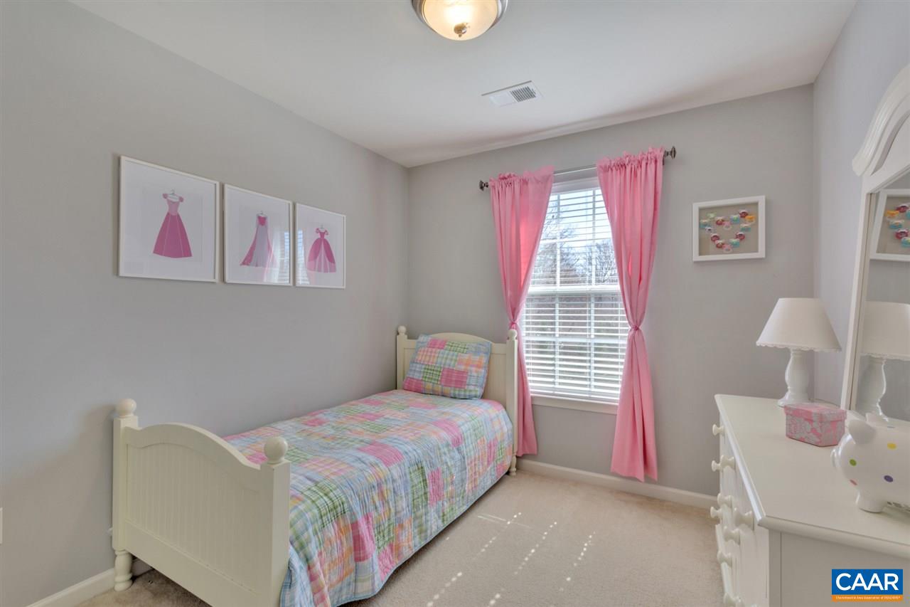 735 Rainier Road Charlottesville, VA 22903 - Photo 25 of 30 a bedroom with a bed and a window
