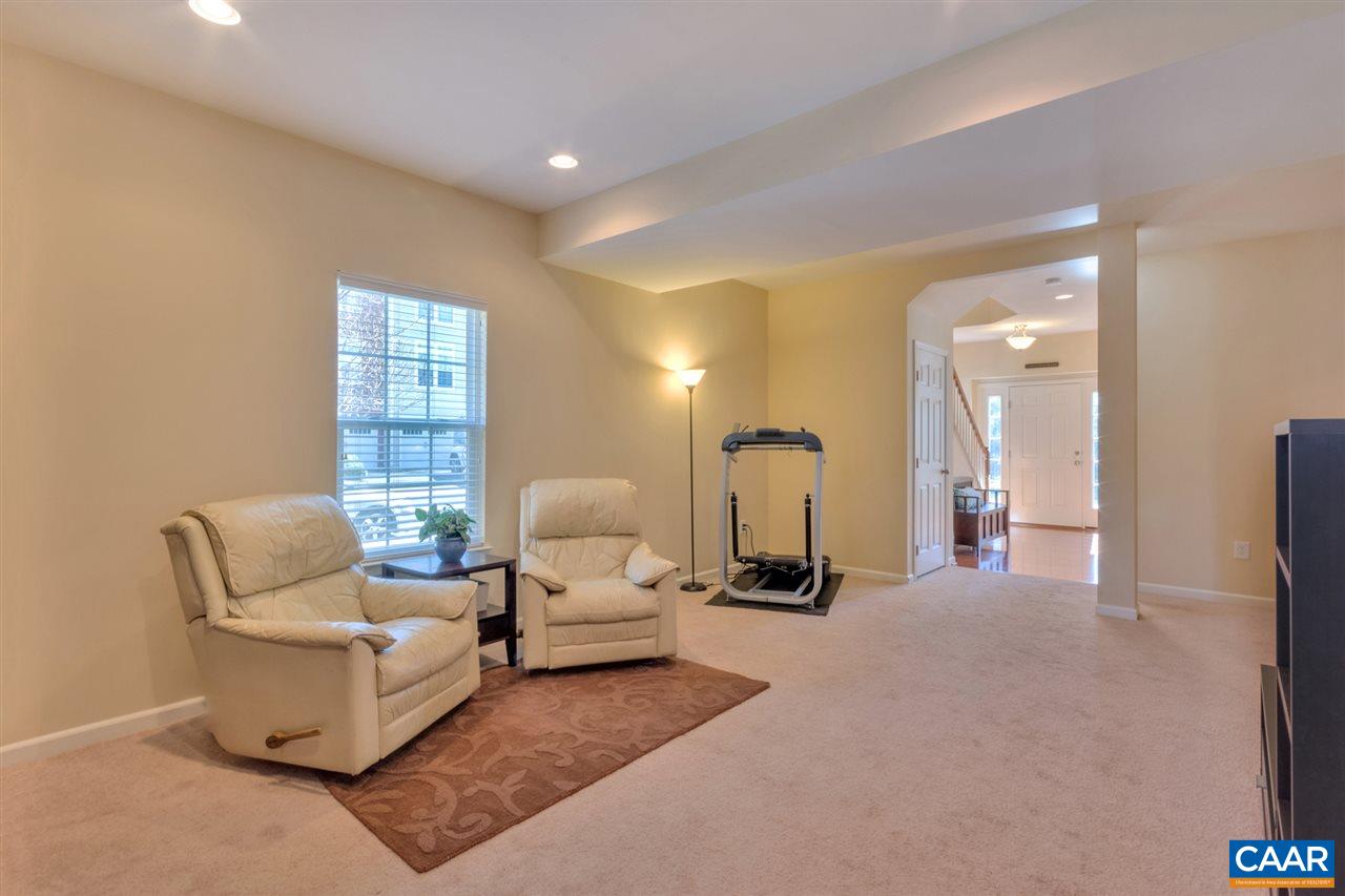 735 Rainier Road Charlottesville, VA 22903 - Photo 7 of 30 a living room with furniture and a large window