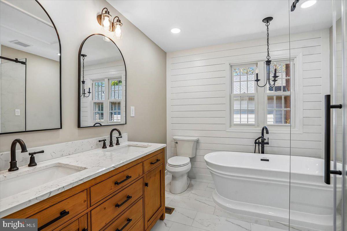 6904 Chelsea Road McLean, VA 22101 - Photo 5 of 15 Elegant bathroom with modern charm.