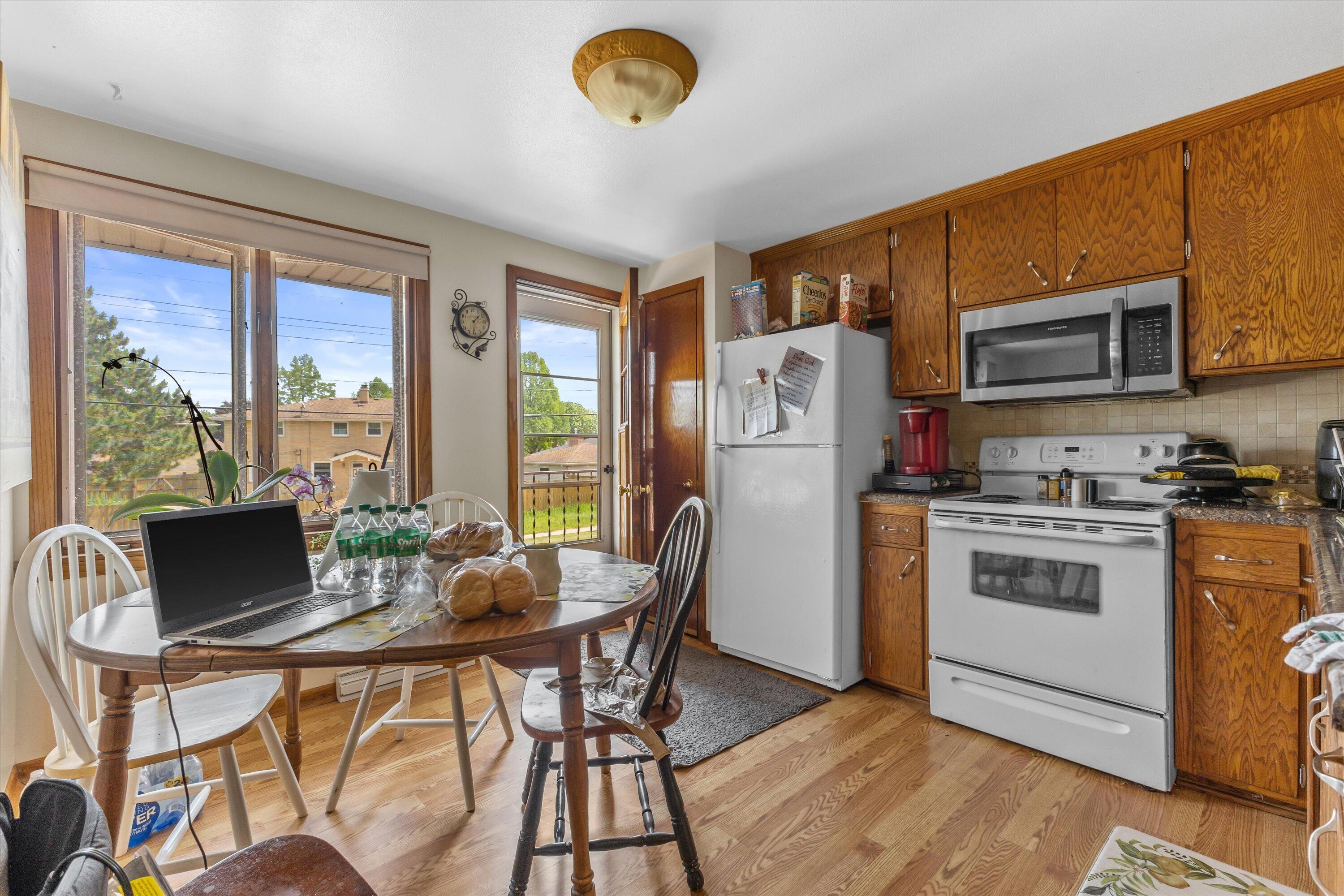3732 South 75th Street Milwaukee, WI 53220 - Photo 27 of 43 Upper Kitchen w/Access to Balcony