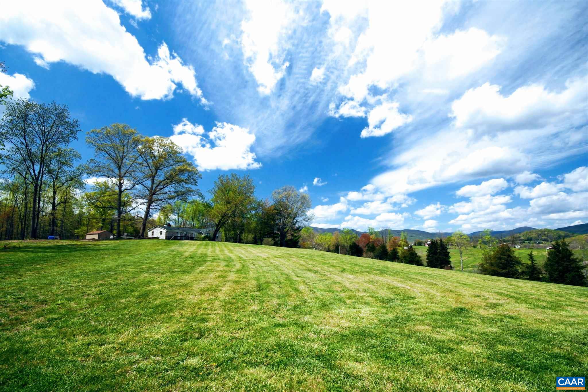 Tba Octonia Road Stanardsville, VA 22973 - Photo 41 of 42 a view of a grassy field with an trees
