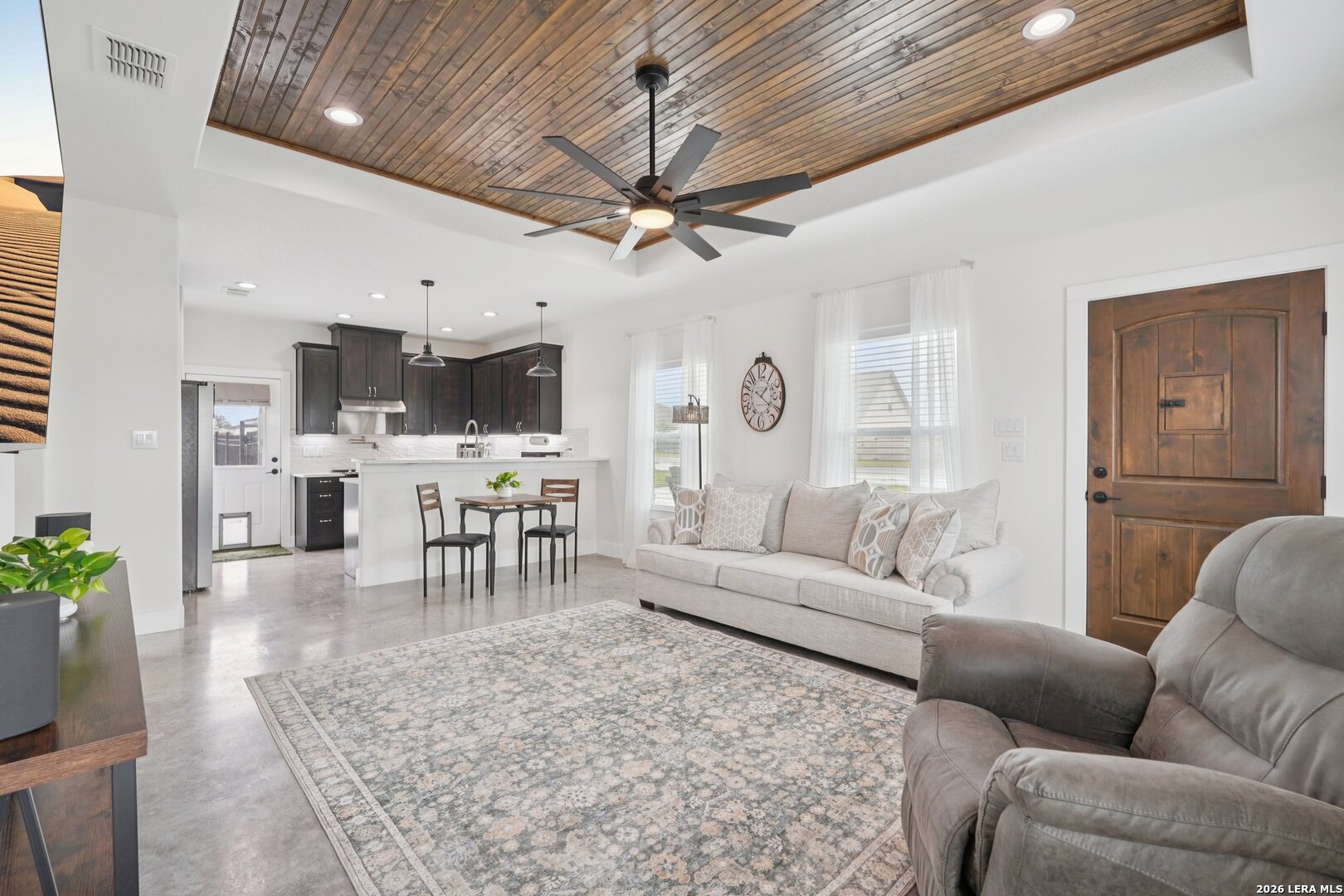 218 Colonial Lane La Vernia, TX 78121 - Photo 13 of 46 a living room with furniture and kitchen view