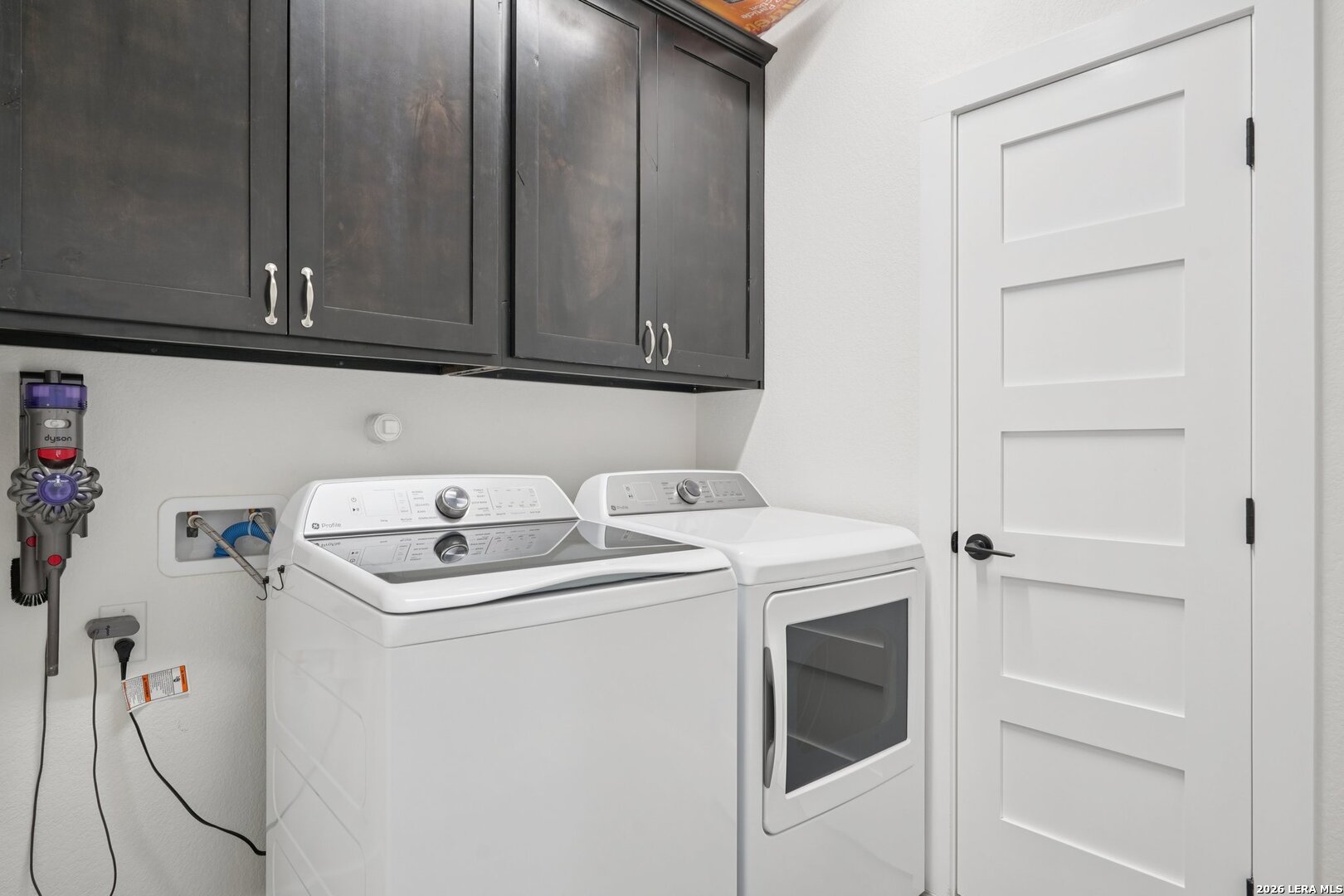 218 Colonial Lane La Vernia, TX 78121 - Photo 20 of 46 a utility room with dryer and washer