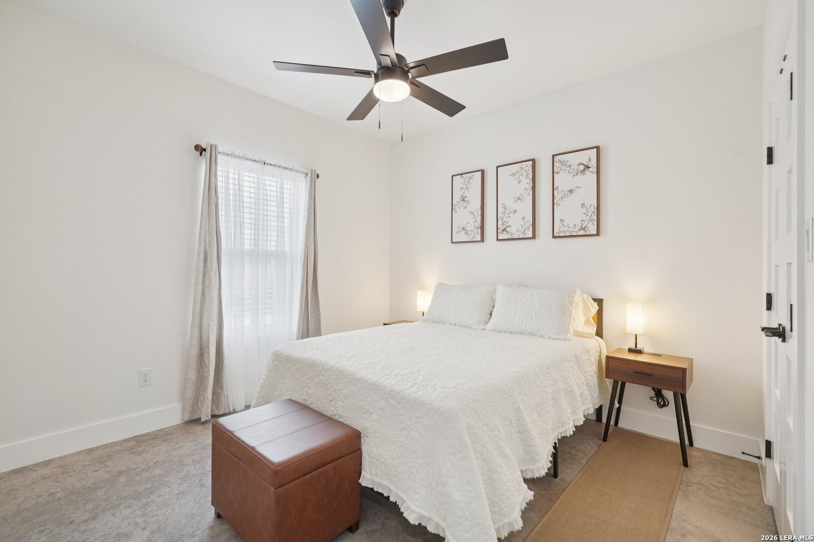 218 Colonial Lane La Vernia, TX 78121 - Photo 27 of 46 a bedroom with a bed and a chair