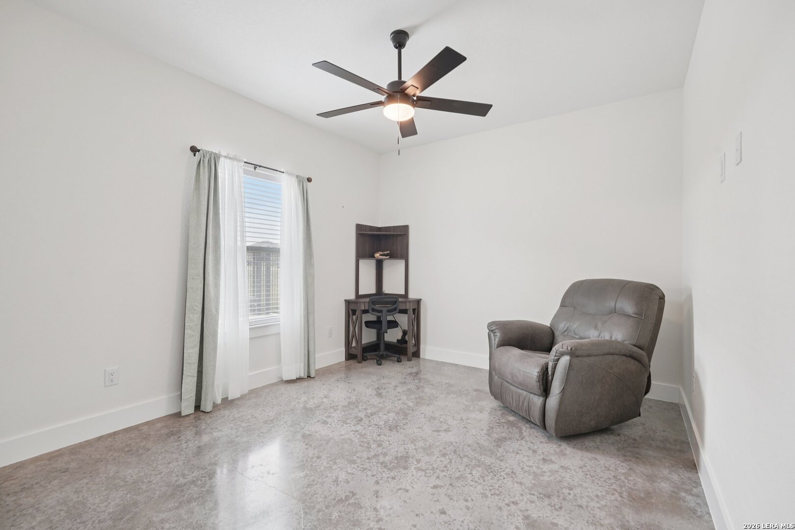218 Colonial Lane La Vernia, TX 78121 - Photo 29 of 46 an empty room with furniture and windows
