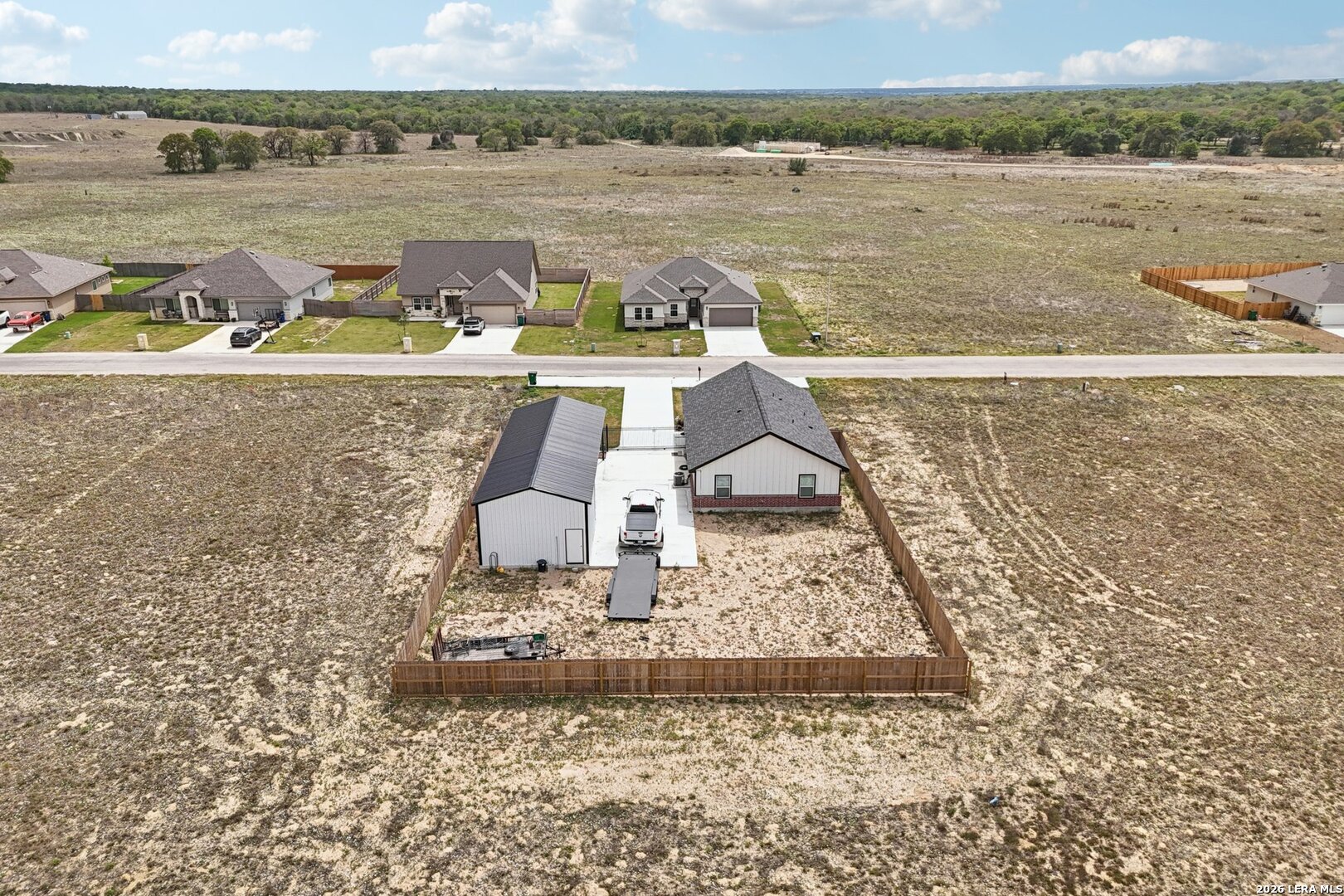 218 Colonial Lane La Vernia, TX 78121 - Photo 45 of 46 a view of a lake with a mountain