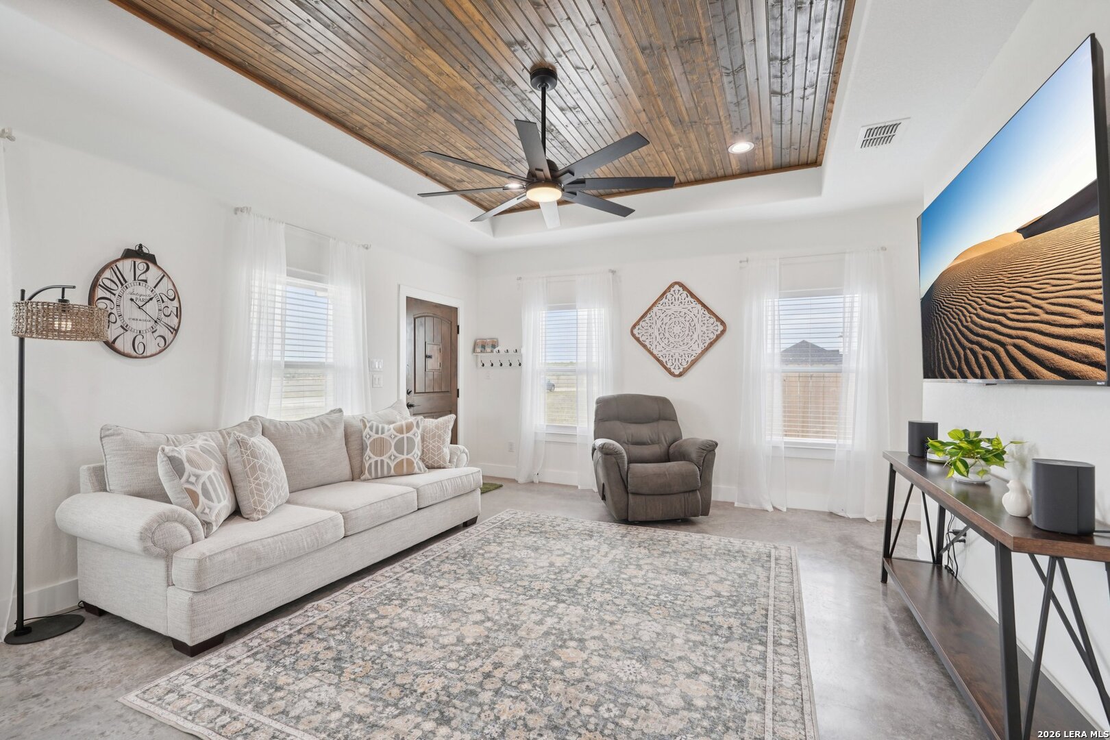 218 Colonial Lane La Vernia, TX 78121 - Photo 9 of 46 a living room with furniture and a chandelier