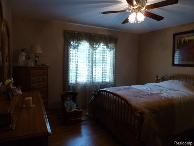2727 Bowen Road Howell, MI 48843 - Photo 22 of 34 Second Bedroom / Hardwood Floor