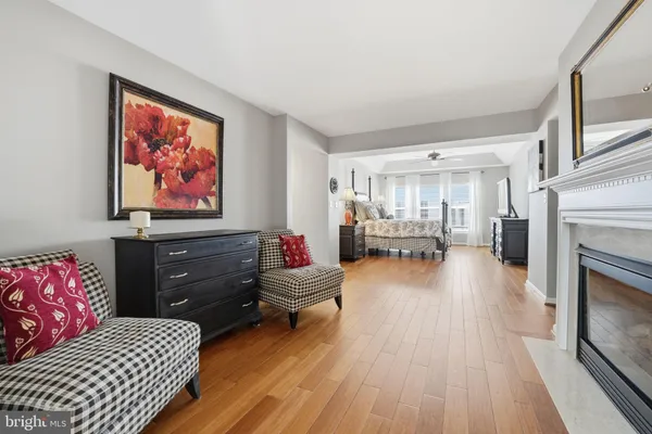 a bedroom with a bed and a table