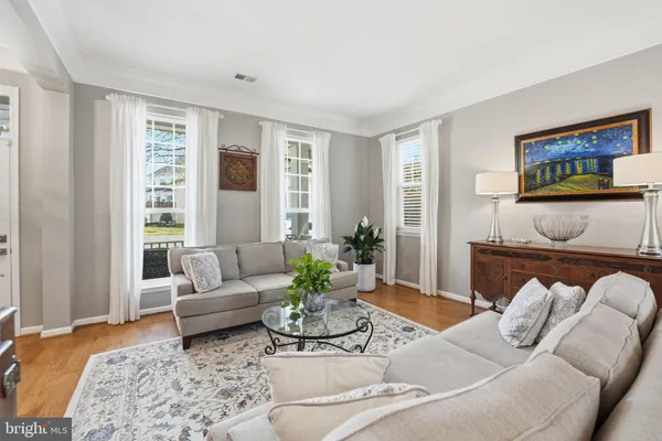 a living room with furniture and window