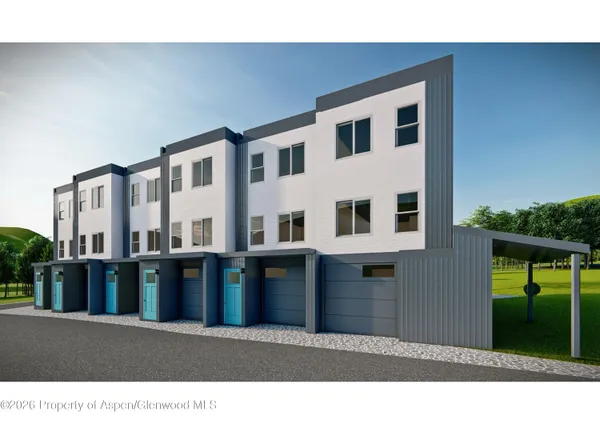 a black and white photo of a house