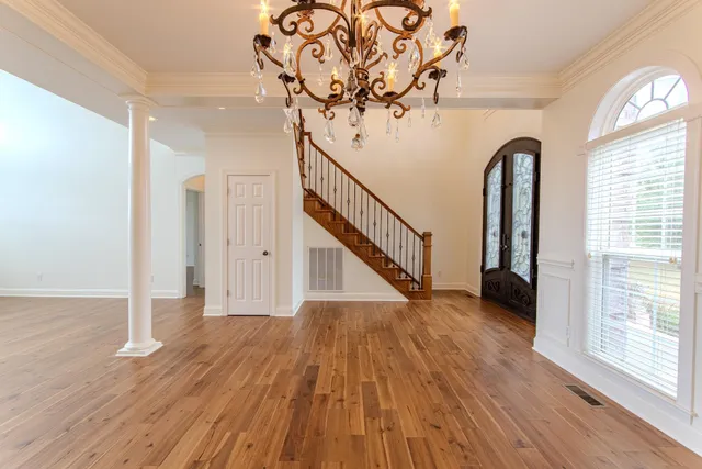 a view of entryway with wooden floor
