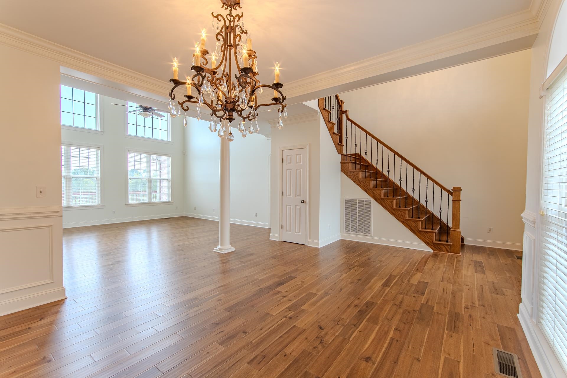 5166 Middlefork Road Luray, TN 38352 - Photo 5 of 40 a view of a livingroom with wooden floor and stairs