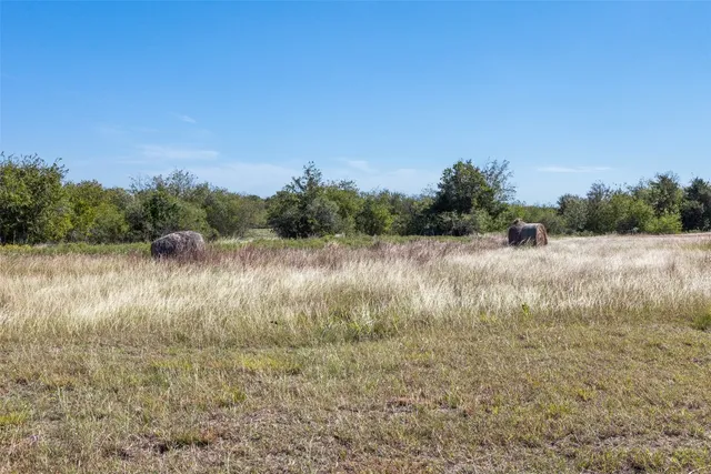 a view of lake with green space