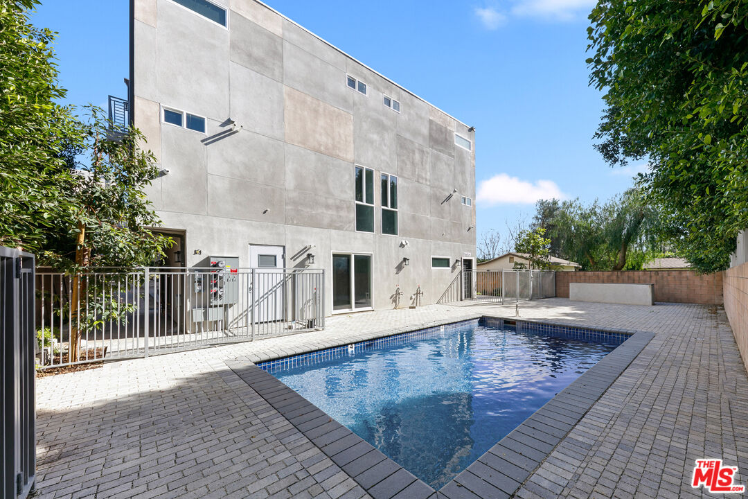 15106 Roxford Street, Unit 13621 Los Angeles, CA 91342 - Photo 4 of 22 swimming pool view with a outdoor space