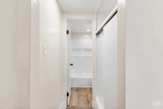 a view of a pathway along the house