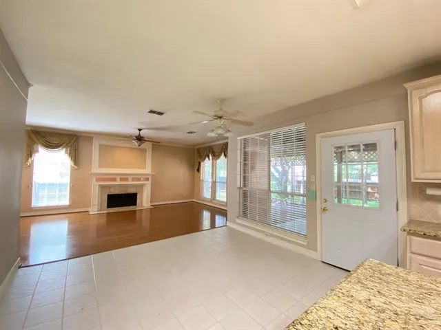 a view of a kitchen with appliances and cabinets
