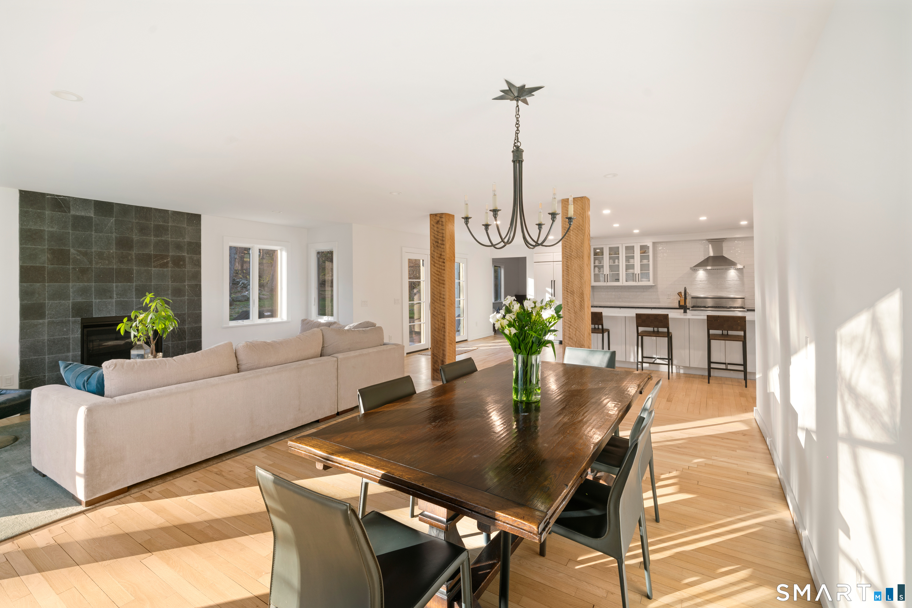 23 Norton Road Easton, CT 06612 - Photo 8 of 40 Beautiful natural oak hardwood floors flow throughout the ktichen, dining area and family room.