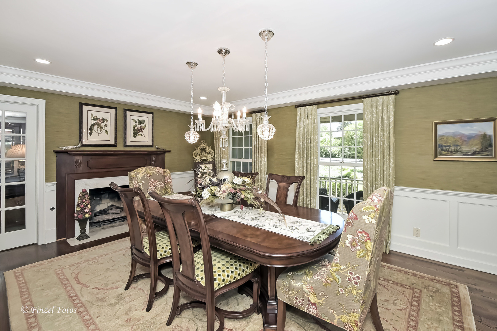 52 Bluff Road Trout Valley, IL 60013 - Photo 12 of 36 a view of a dining room with furniture and a chandelier