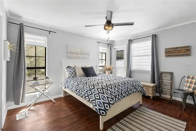 a bedroom with a bed and a table in it