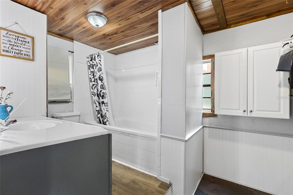 1069 Southeast Suwannee Trail Branford, FL 32008 - Photo 27 of 47 a bathroom with a sink and a mirror