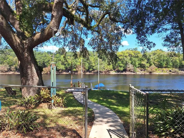 a view of a lake with a house