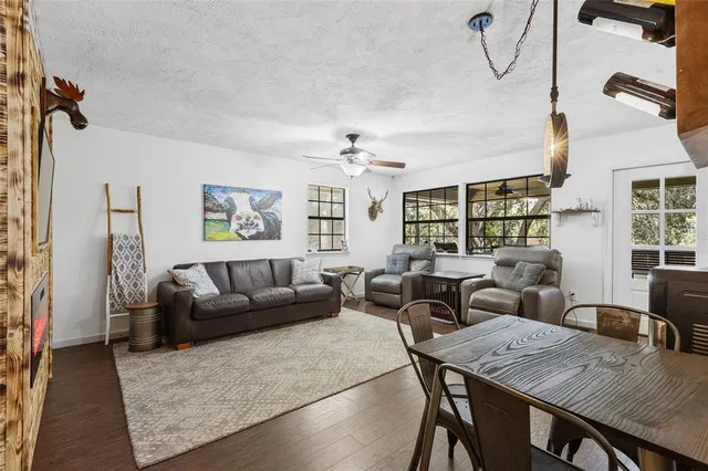 a living room with furniture and a table